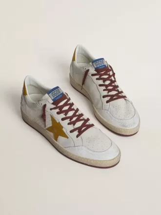 Zapatillas Ball Star para hombre en piel napa blanca con estrella y lengüeta en el talón en piel con estampado animal amarillo