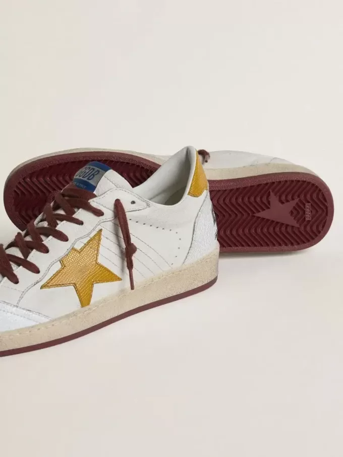 Zapatillas Ball Star para hombre en piel napa blanca con estrella y lengüeta en el talón en piel con estampado animal amarillo